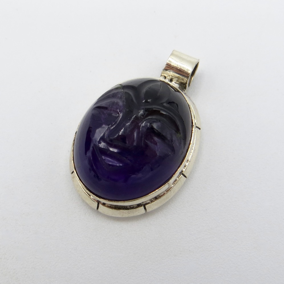 Silver and Amethyst Face Pendant