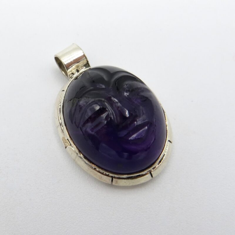 Silver and Amethyst Face Pendant