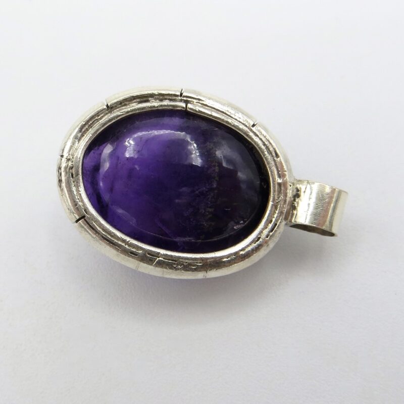 Silver and Amethyst Face Pendant