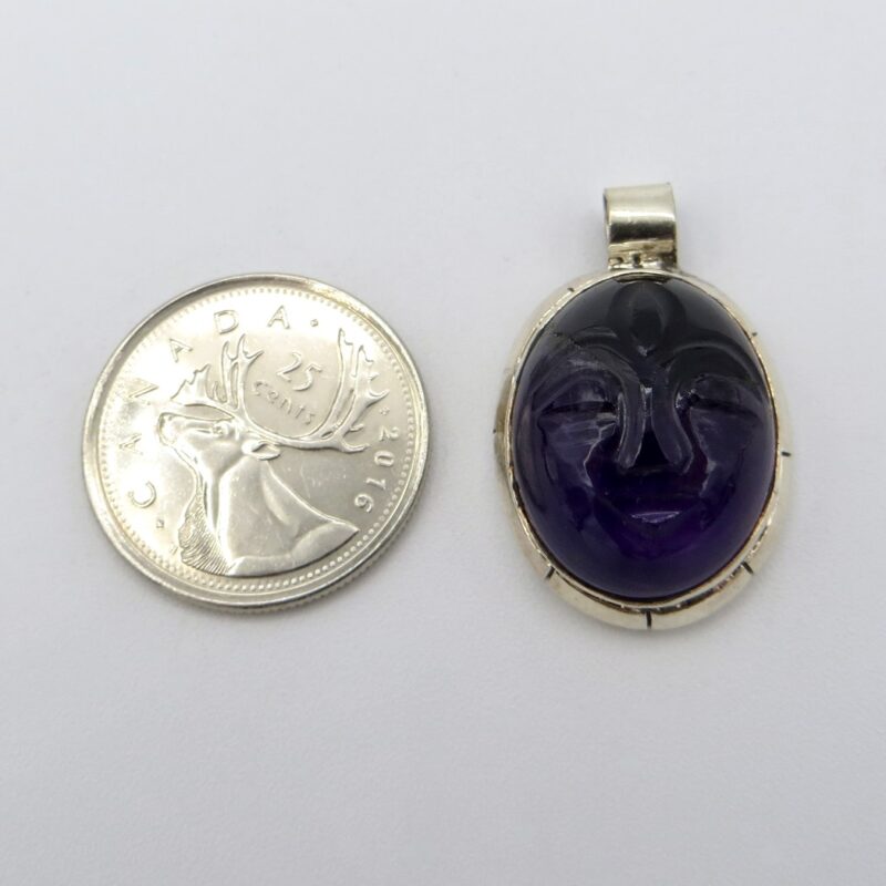 Silver and Amethyst Face Pendant