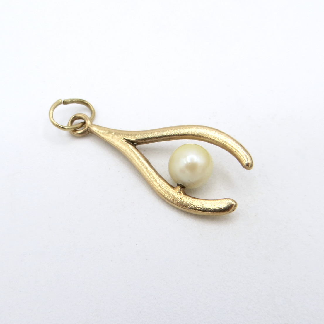 Gold and Pearl Wishbone Pendant