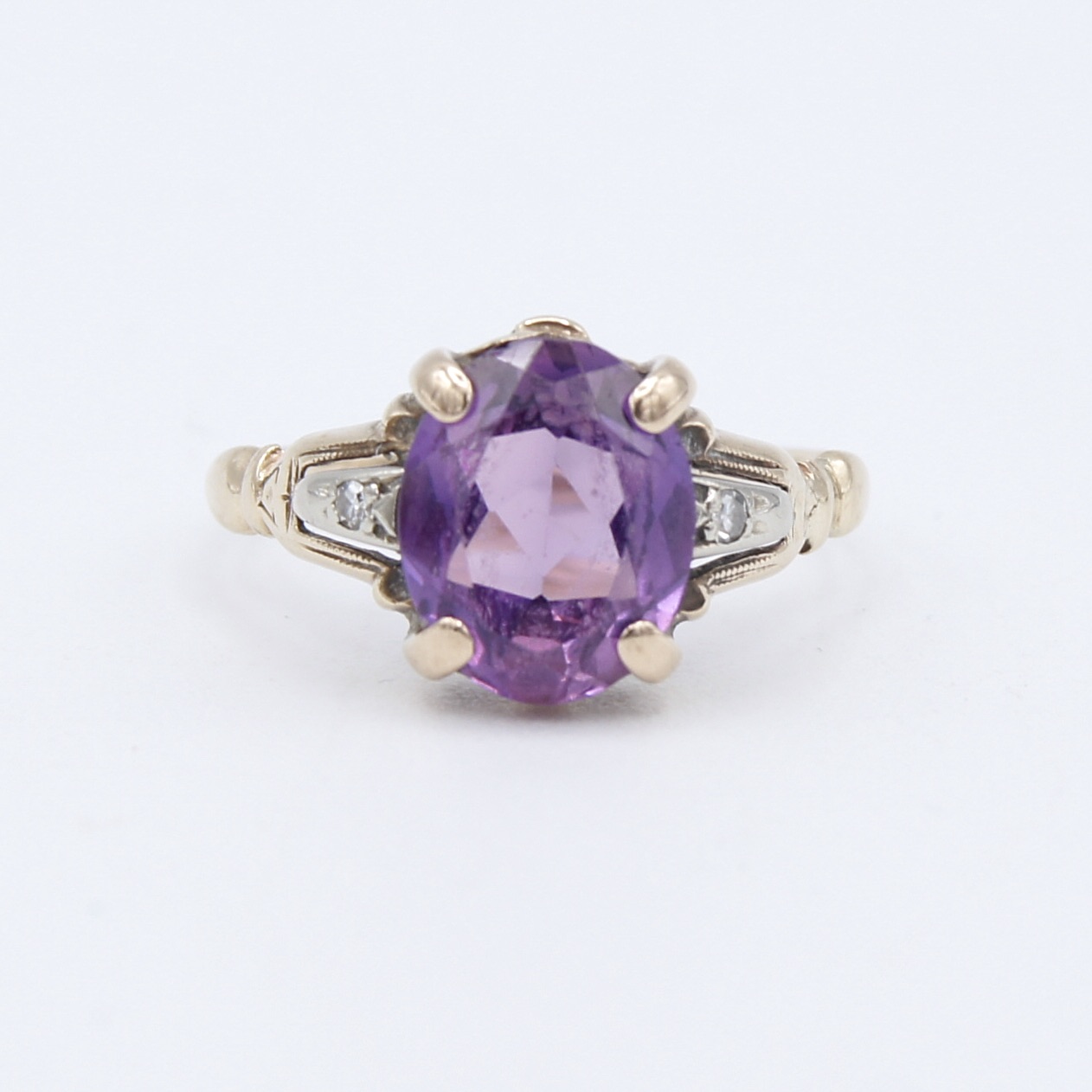 Gold Ring with Violet Stone